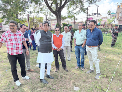 Mayor of Agartala Municipal Corporation (AMC) Dipak Majumder inspects a site for proposed water treatment plant construction at Bani Vidyapeeth School in Agartala on December 17.